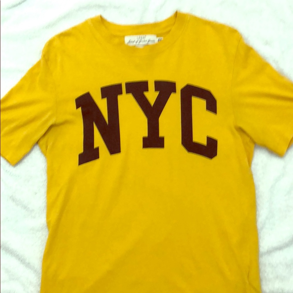 A yellow H&M shirt